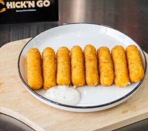 A plate of food on top of a wooden table.