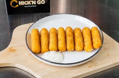 A plate of food on top of a wooden table.